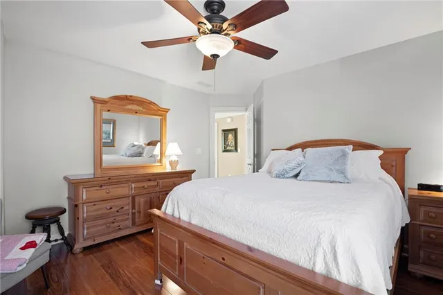 a view of a house with backyard porch and sitting area