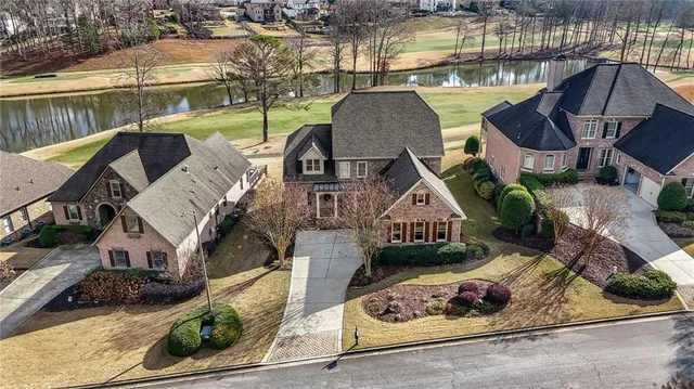 a view of a lake with a mountain from a terrace