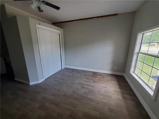 an empty room with windows