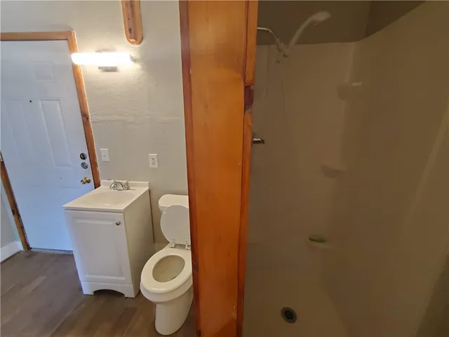 a bathroom with a toilet and a sink