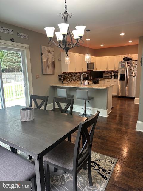 213 Church Street Newfield, NJ 08344 - Photo 14 of 36 a view of a dining room with furniture and wooden floor