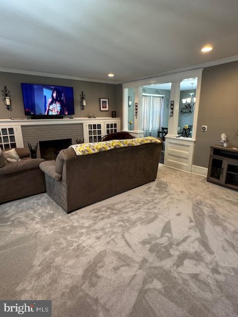 213 Church Street Newfield, NJ 08344 - Photo 17 of 36 a living room with furniture a bookshelf and a flat screen tv
