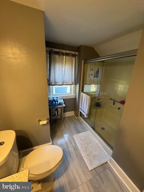 213 Church Street Newfield, NJ 08344 - Photo 31 of 36 a bathroom with a sink mirror vanity and toilet