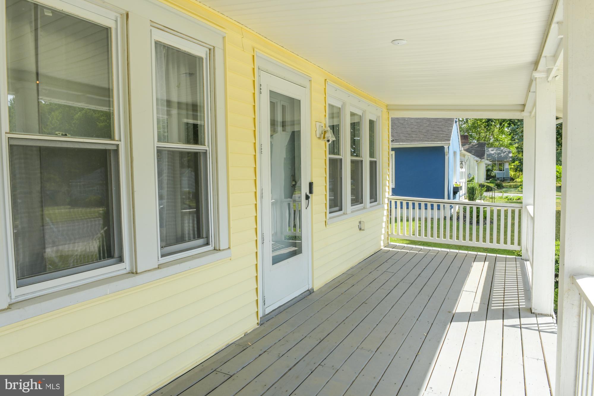 213 Church Street Newfield, NJ 08344 - Photo 4 of 36 a view of a balcony with wooden floor