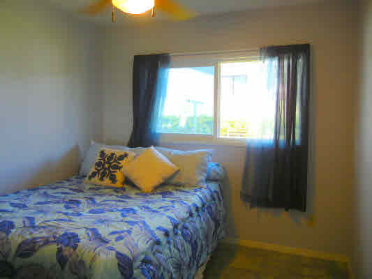 4800 Nonou Road Kapaa, HI 96746 - Photo 12 of 20 a bedroom with a bed and a window