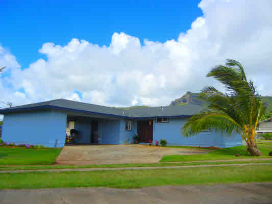 4800 Nonou Road Kapaa, HI 96746 - Photo 18 of 20 a front view of a house with a yard and garage