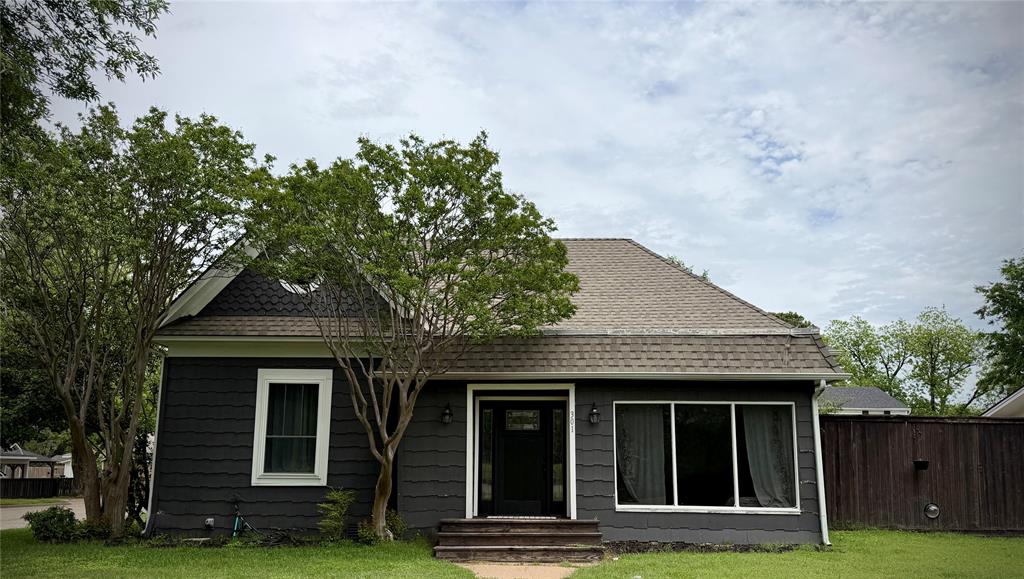 301 Forrest Avenue Cleburne, TX 76033 - Photo 1 of 14 Charming historic home in Original Cleburne!! Charcoal gray siding exterior with white window trim