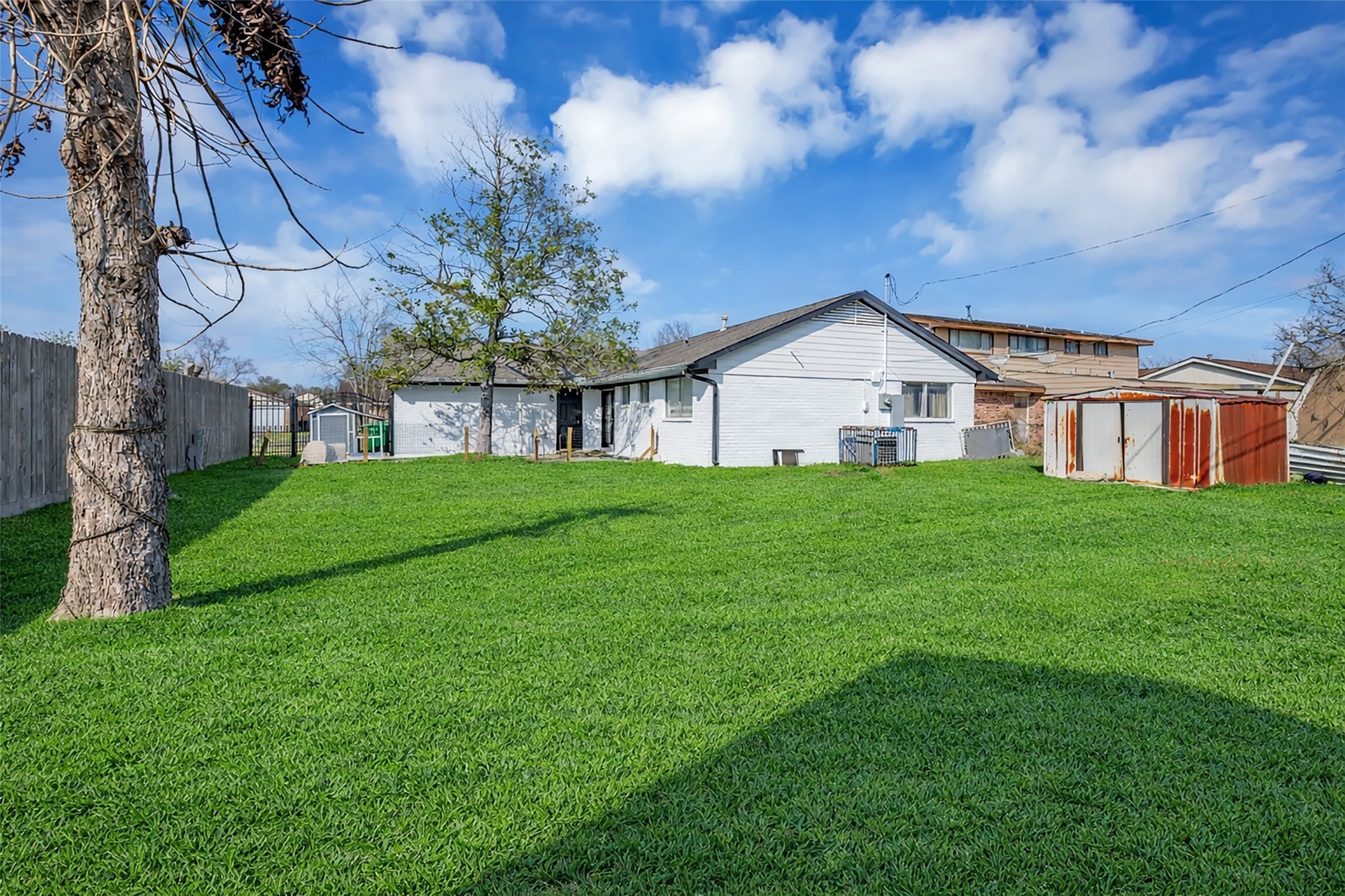 10730 Filey Lane Houston, TX 77013 - Photo 22 of 25 A huge yard for relaxing and entertaining!