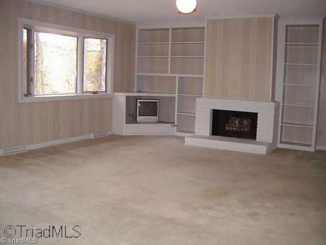 Other. The living room, along with most of the rooms in the home features convenient built ins and those great lake views!