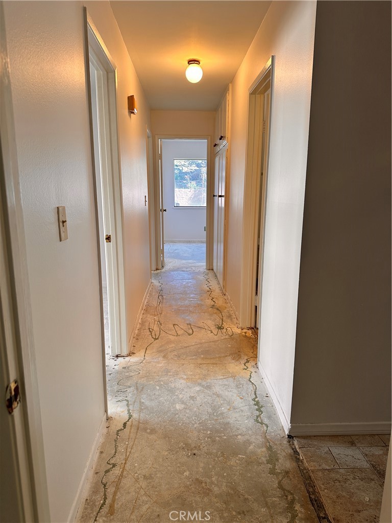 23712 Highlander Road West Hills, CA 91307 - Photo 18 of 21 a view of a hallway with wooden floor