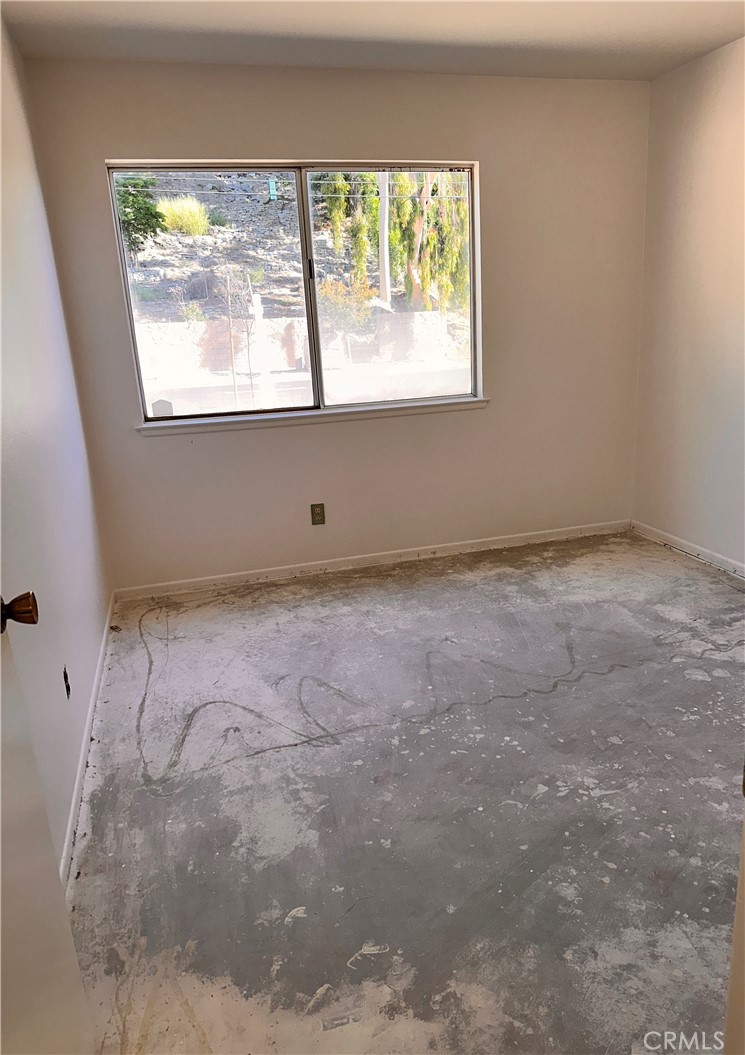 23712 Highlander Road West Hills, CA 91307 - Photo 19 of 21 an empty room with a window
