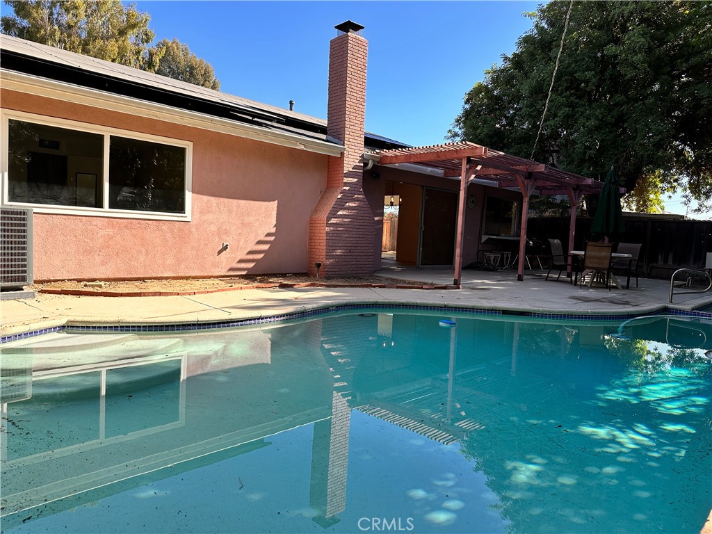 23712 Highlander Road West Hills, CA 91307 - Photo 3 of 21 a swimming pool with outdoor seating yard and outdoor seating