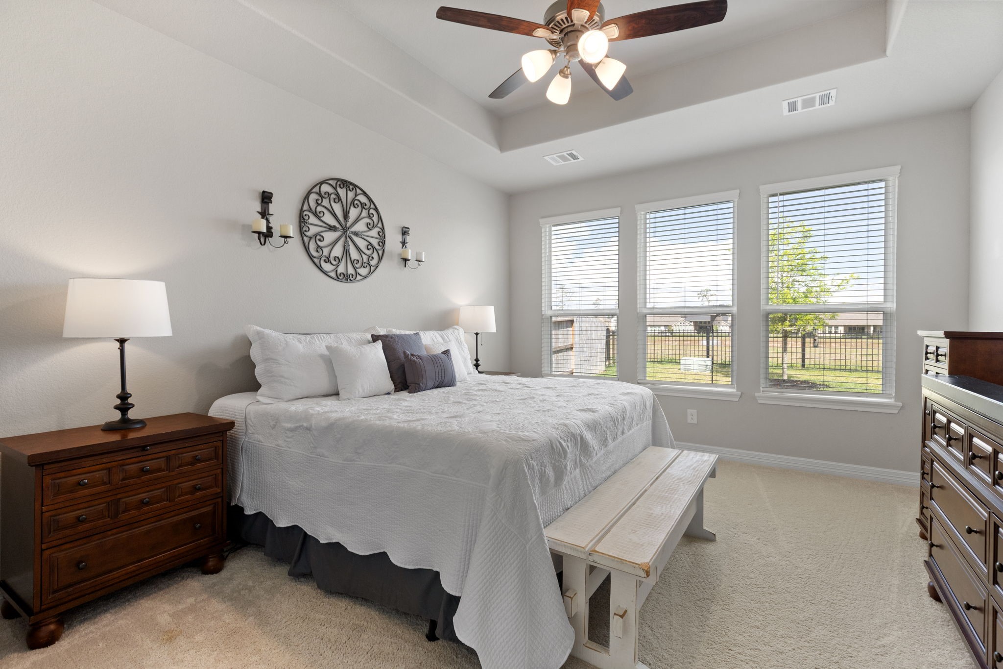 3541 Cherrybark Gable Ln Spring Spring, TX 77386 - Photo 17 of 39 Spacious primary bedroom on the first floor with great views of the lake behind the home.