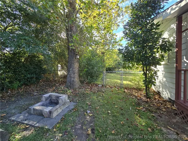a view of a house with a garden