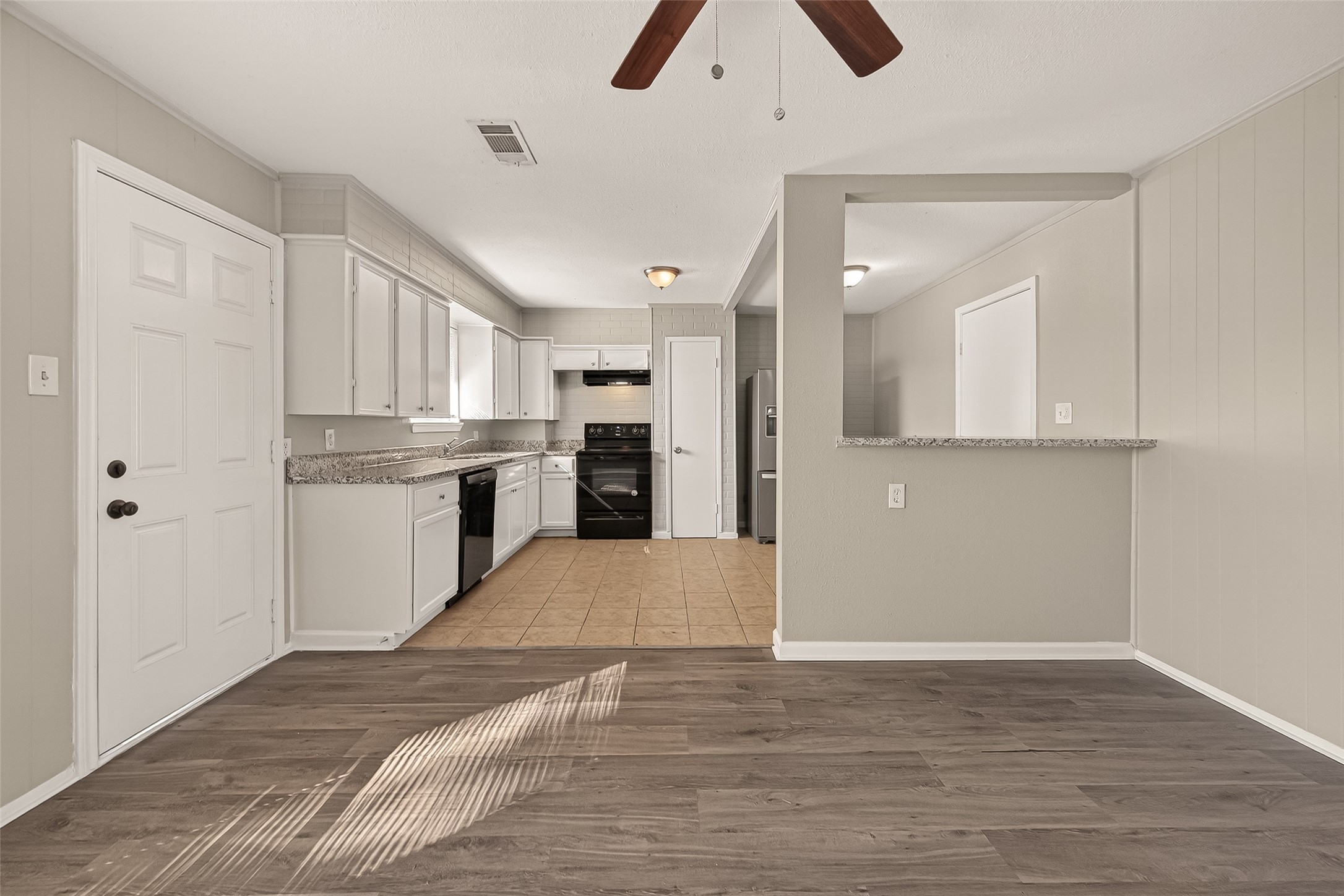 3102 Hays Street Pasadena, TX 77503 - Photo 19 of 25 a view of kitchen with wooden floor