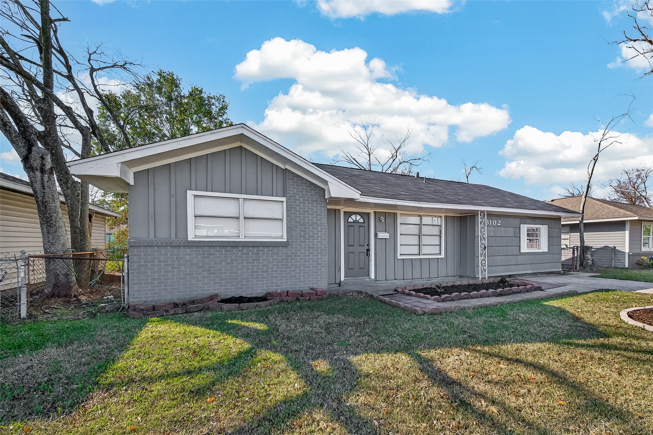 3102 Hays Street Pasadena, TX 77503 - Photo 2 of 25 a front view of a house with a garden