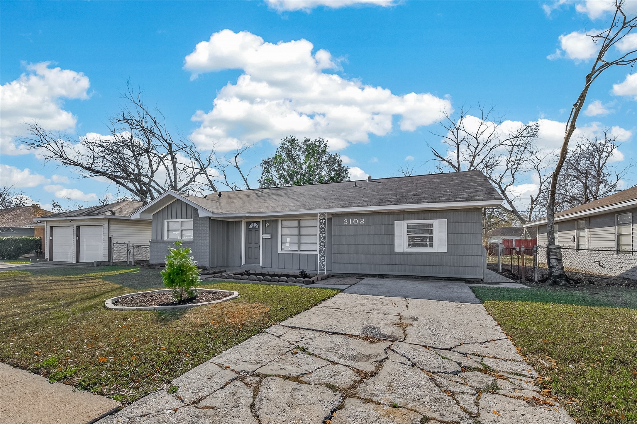 3102 Hays Street Pasadena, TX 77503 - Photo 5 of 25 a front view of a house with garden