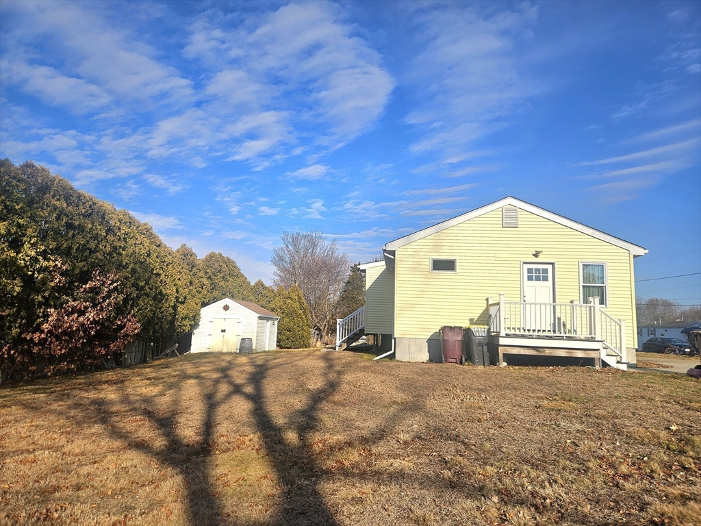 5 William Street Acushnet, MA 02743 - Photo 19 of 20 a view of a house with wooden fence