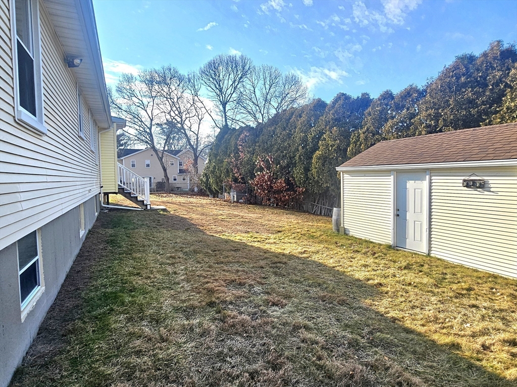 5 William Street Acushnet, MA 02743 - Photo 20 of 20 a view of a house with backyard and trees