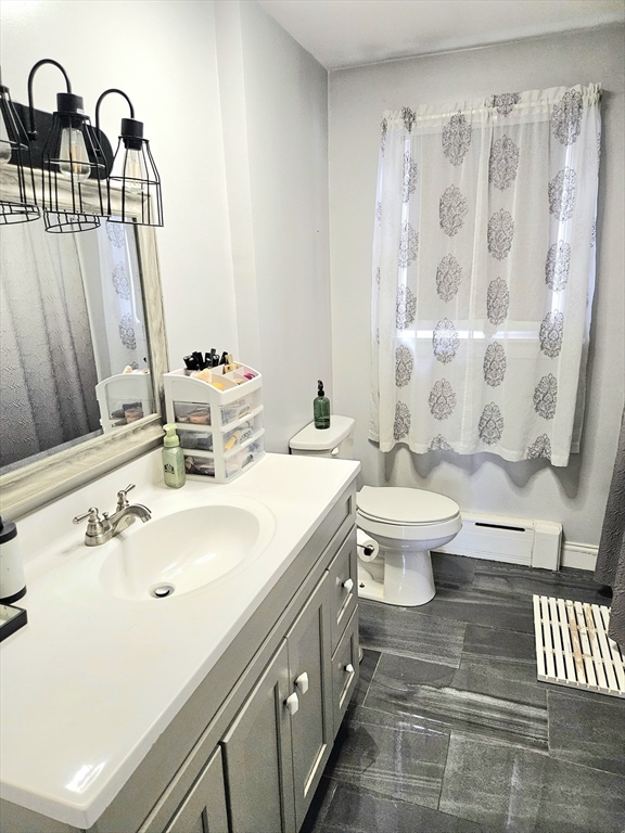 5 William Street Acushnet, MA 02743 - Photo 7 of 20 a bathroom with a sink toilet and shower