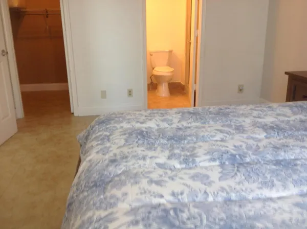 a view of a swimming pool with outdoor seating