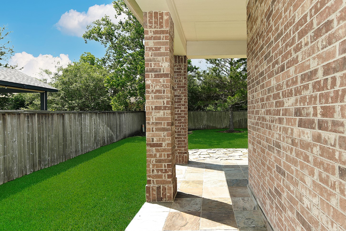 35 Granite Path Place Spring, TX 77389 - Photo 26 of 40 Covered Walkway to Back Porch