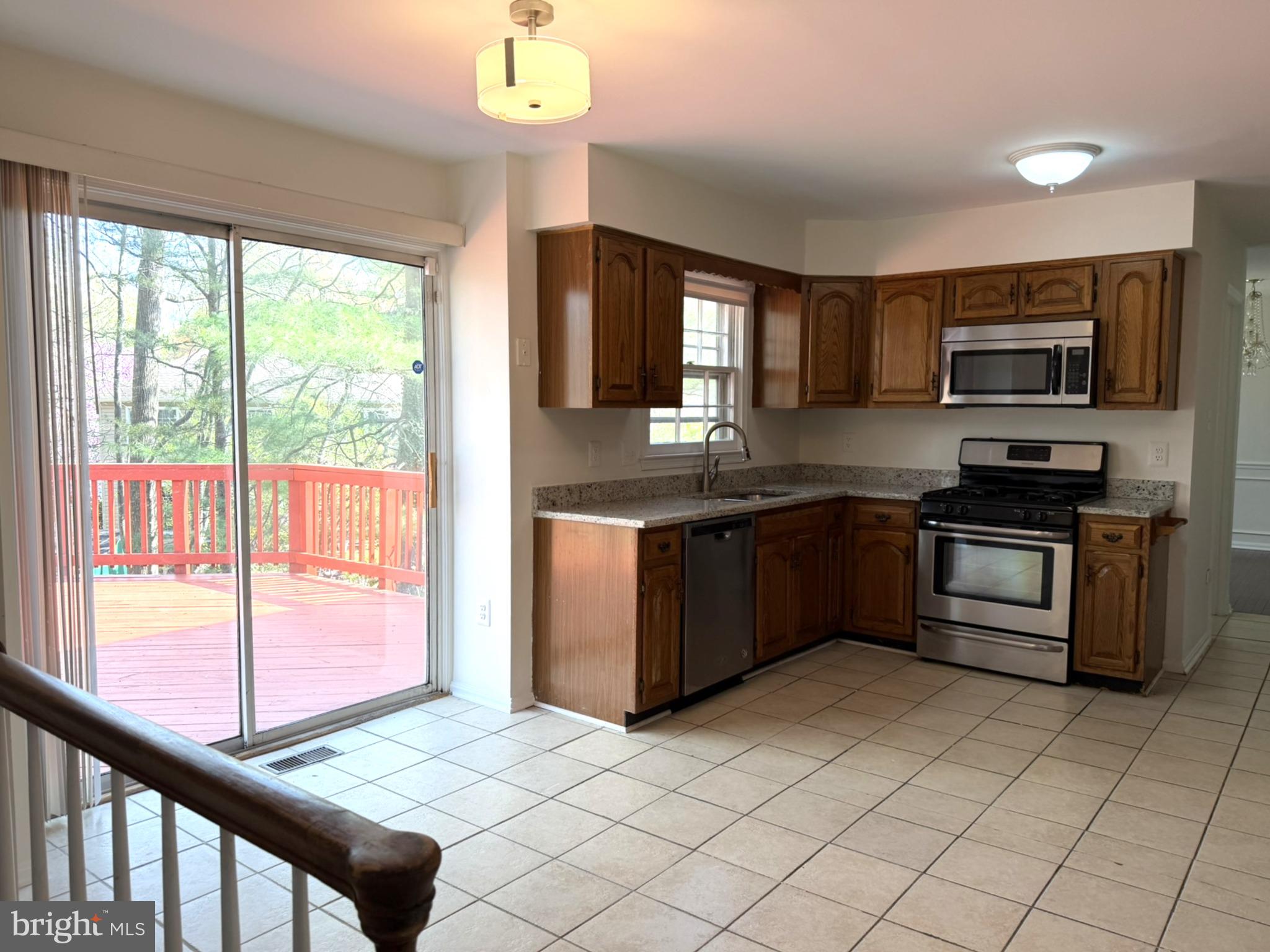 2109 Falling Creek Road Silver Spring, MD 20904 - Photo 14 of 30 Kitchen with slider to Backyard Deck