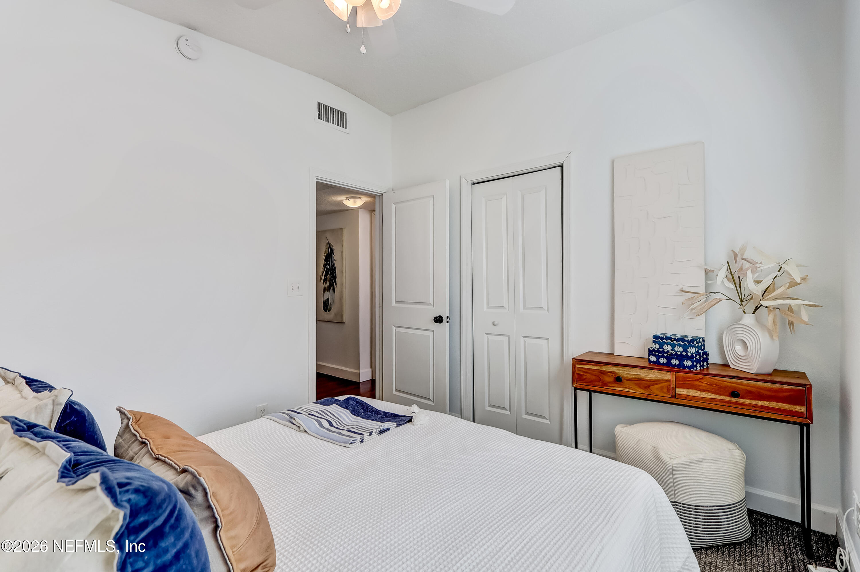 2477 Community Road Jacksonville, FL 32207 - Photo 14 of 33 a bedroom with a bed and a window