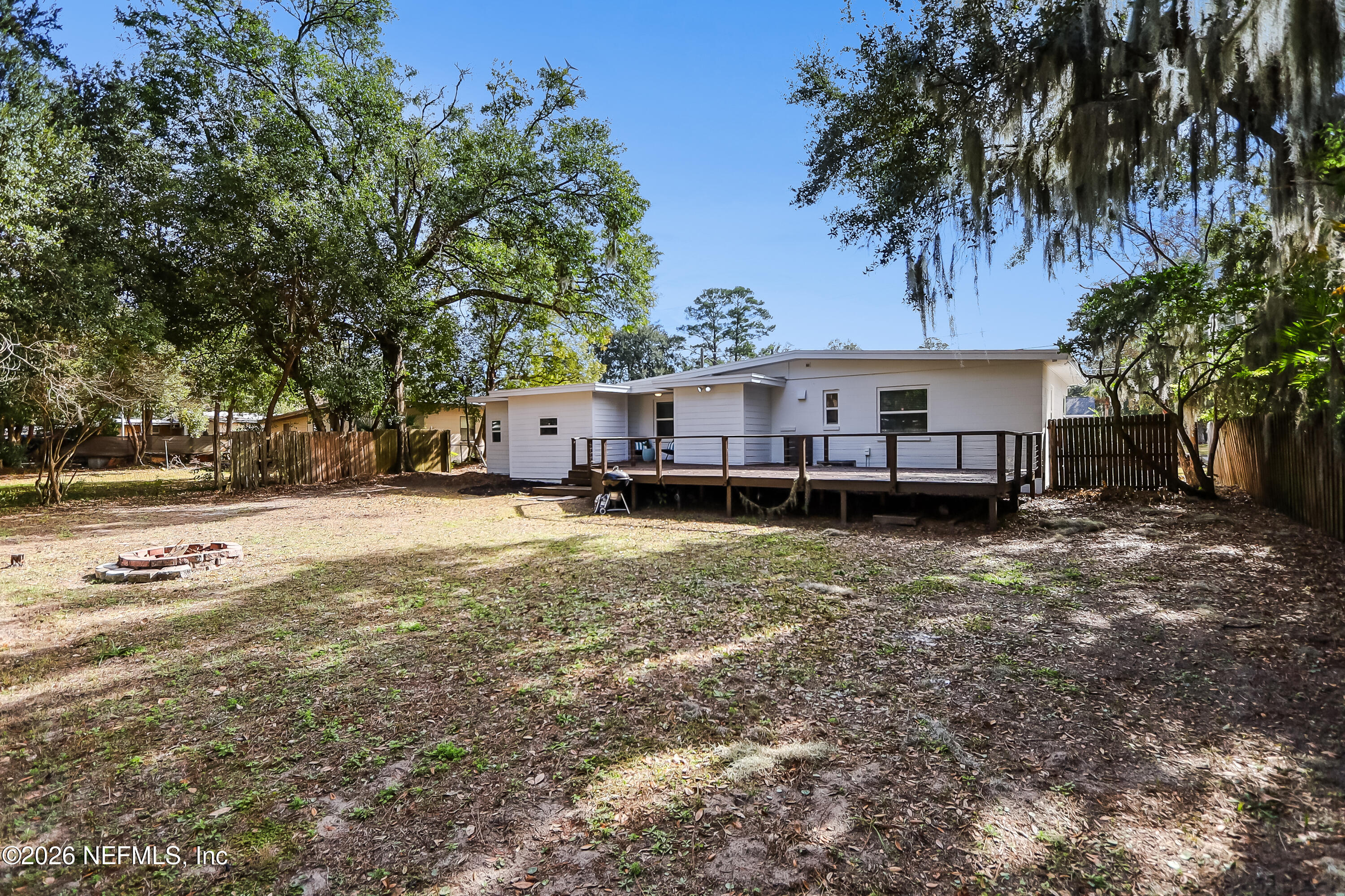 2477 Community Road Jacksonville, FL 32207 - Photo 29 of 33 a view of a house with a yard and sitting area