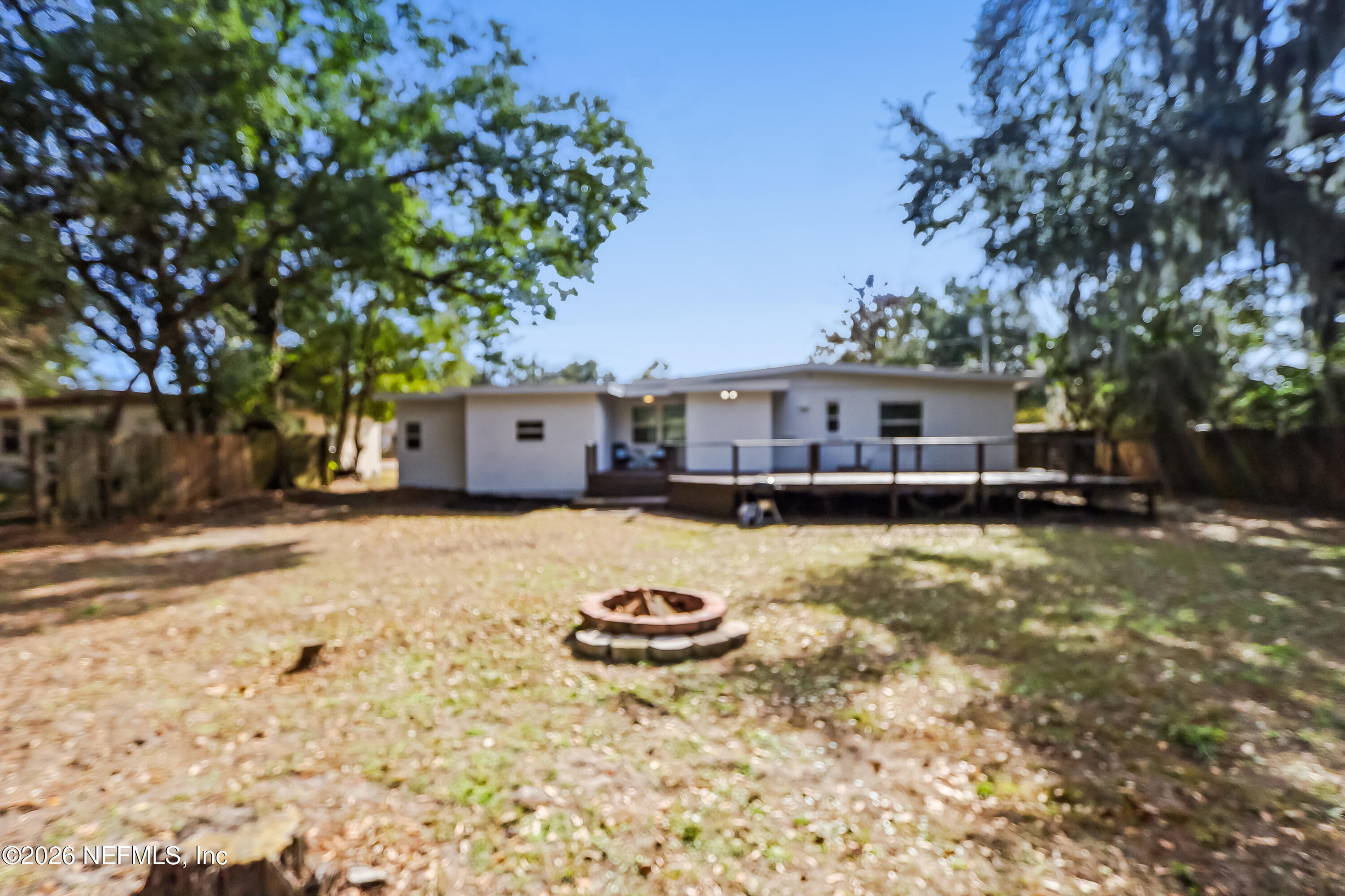 2477 Community Road Jacksonville, FL 32207 - Photo 31 of 33 a view of a house with a yard and sitting area