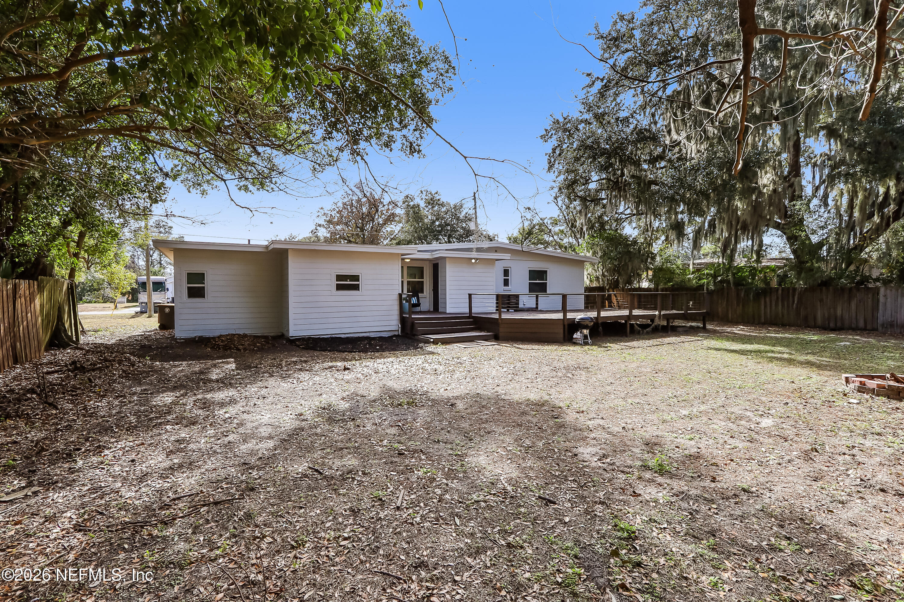 2477 Community Road Jacksonville, FL 32207 - Photo 32 of 33 a view of a house with a yard