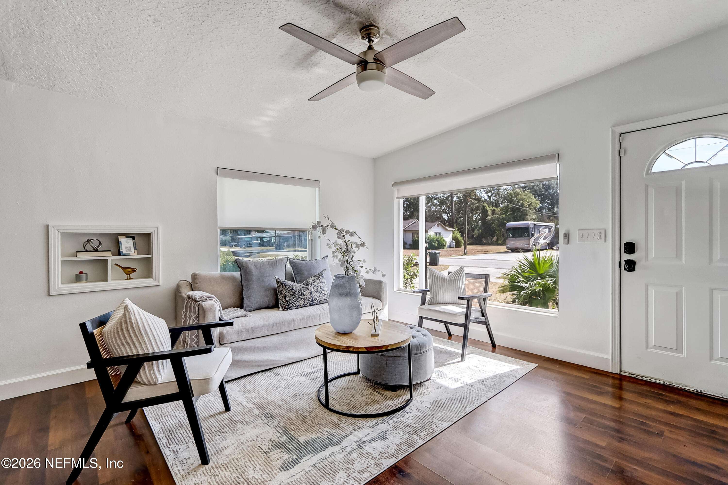 2477 Community Road Jacksonville, FL 32207 - Photo 4 of 33 a living room with furniture and a large window