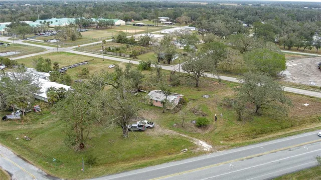 a view of outdoor space with deck and yard