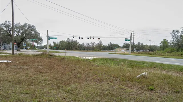 a view of outdoor space with deck and yard