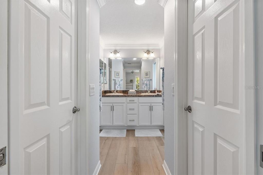 3394 Ridgewood Path The Villages, FL 32163 - Photo 16 of 30 a bathroom with a sink and a mirror
