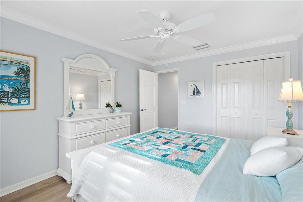 3394 Ridgewood Path The Villages, FL 32163 - Photo 22 of 30 a bedroom with a bed and a chair