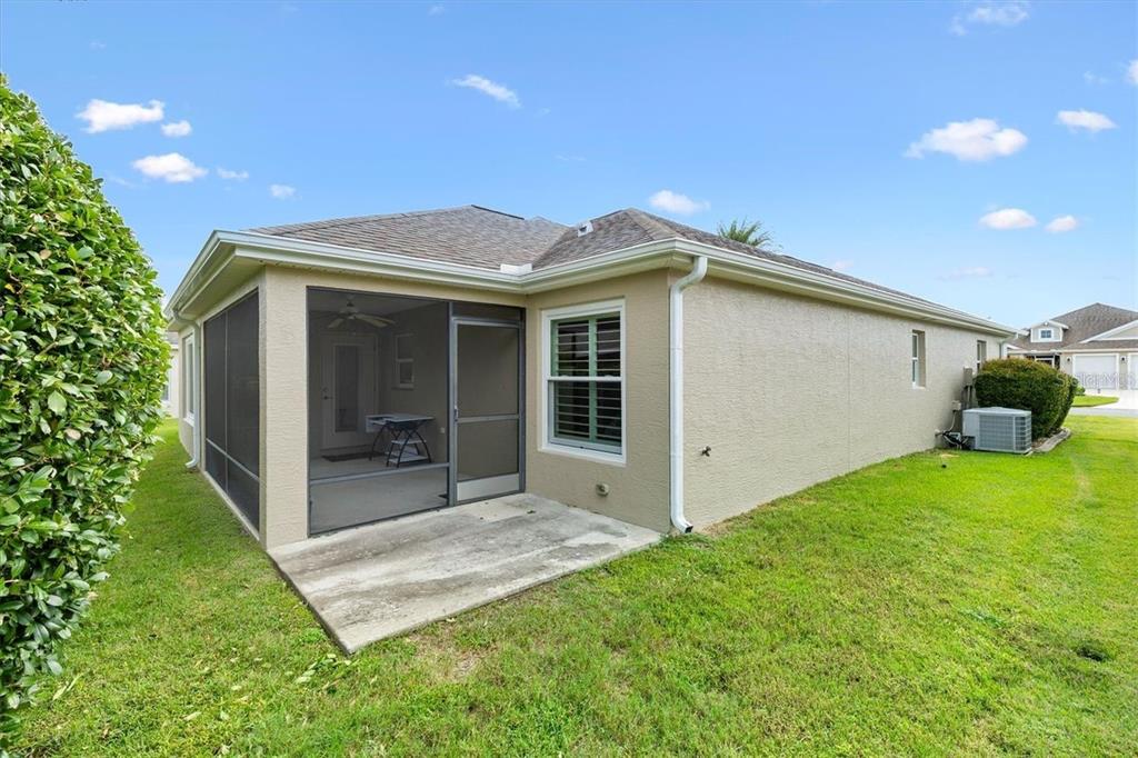 3394 Ridgewood Path The Villages, FL 32163 - Photo 24 of 30 a view of a house with backyard