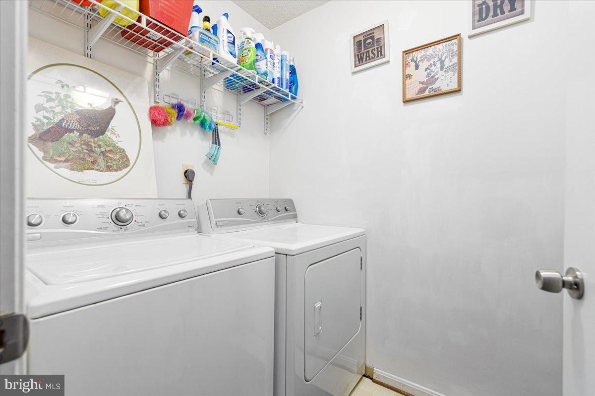 14018 Valleyfield Drive, Unit 8 Silver Spring, MD 20906 - Photo 13 of 20 a bathroom with a sink and a mirror