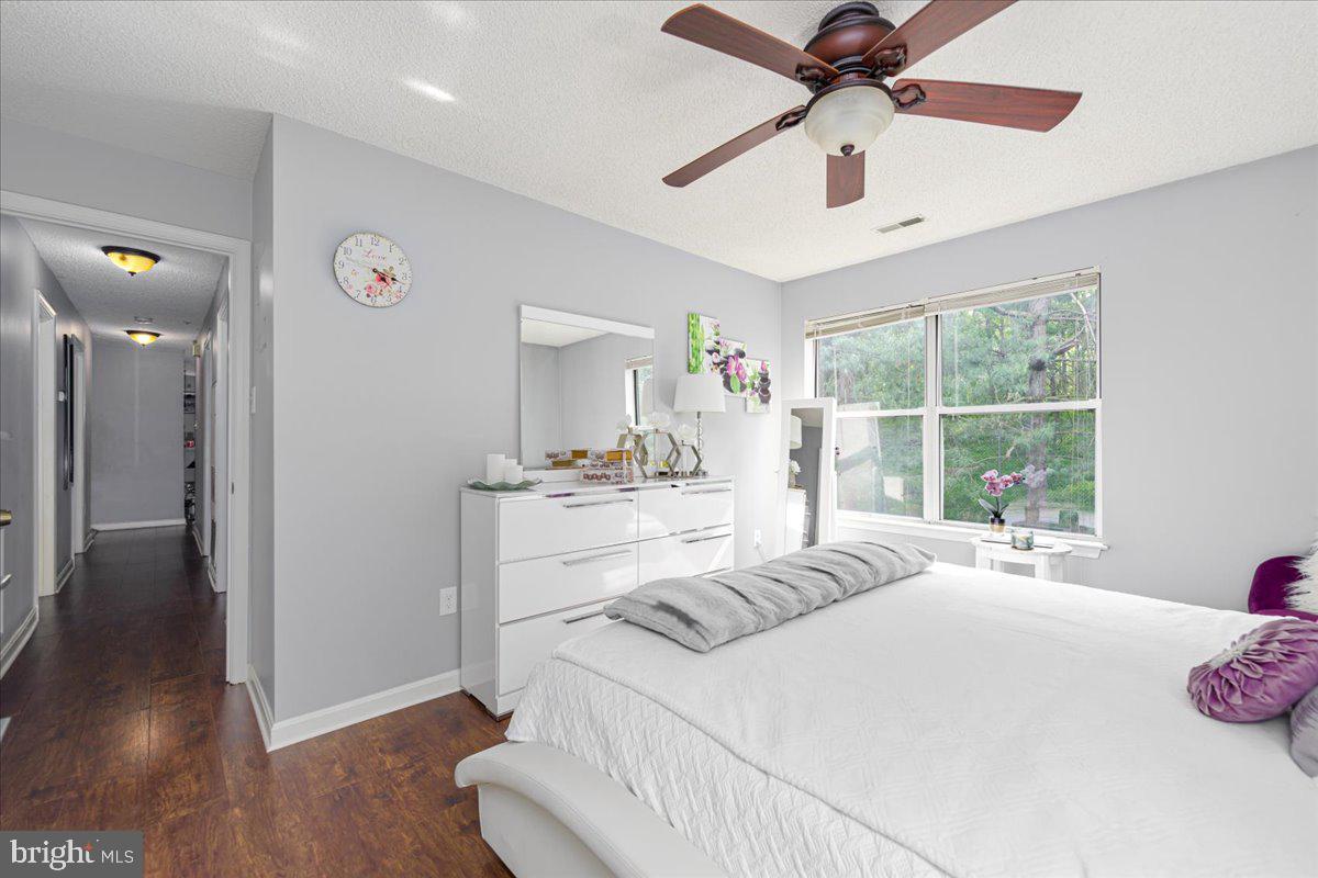 14018 Valleyfield Drive, Unit 8 Silver Spring, MD 20906 - Photo 17 of 20 a large white bed in a white room