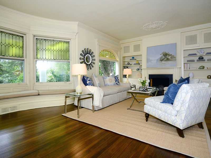 66 Pear Tree Point Road Darien, CT 06820 - Photo 11 of 25 a living room with furniture fireplace and window