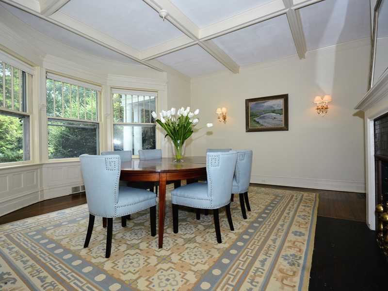 66 Pear Tree Point Road Darien, CT 06820 - Photo 12 of 25 a view of a dining room with furniture window and wooden floor