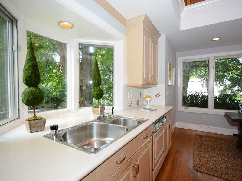 66 Pear Tree Point Road Darien, CT 06820 - Photo 15 of 25 a kitchen with a sink and a large window