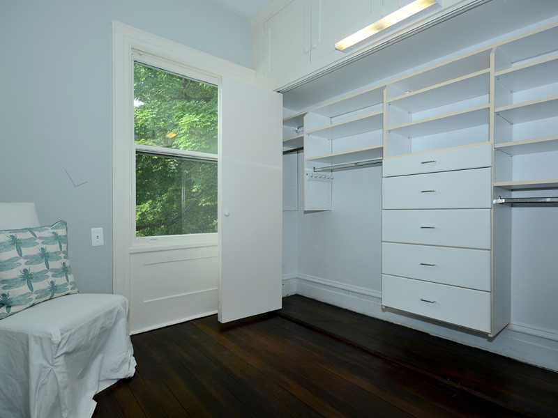 66 Pear Tree Point Road Darien, CT 06820 - Photo 17 of 25 a view of an empty room with a window