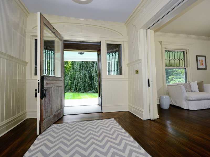 66 Pear Tree Point Road Darien, CT 06820 - Photo 8 of 25 a view of livingroom with furniture and floor to ceiling window