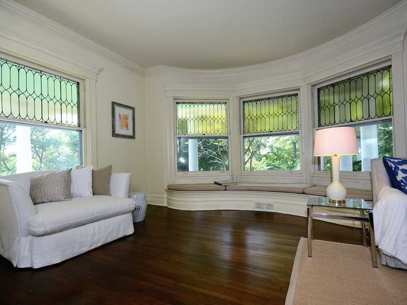 66 Pear Tree Point Road Darien, CT 06820 - Photo 10 of 25 a living room with furniture and a large window
