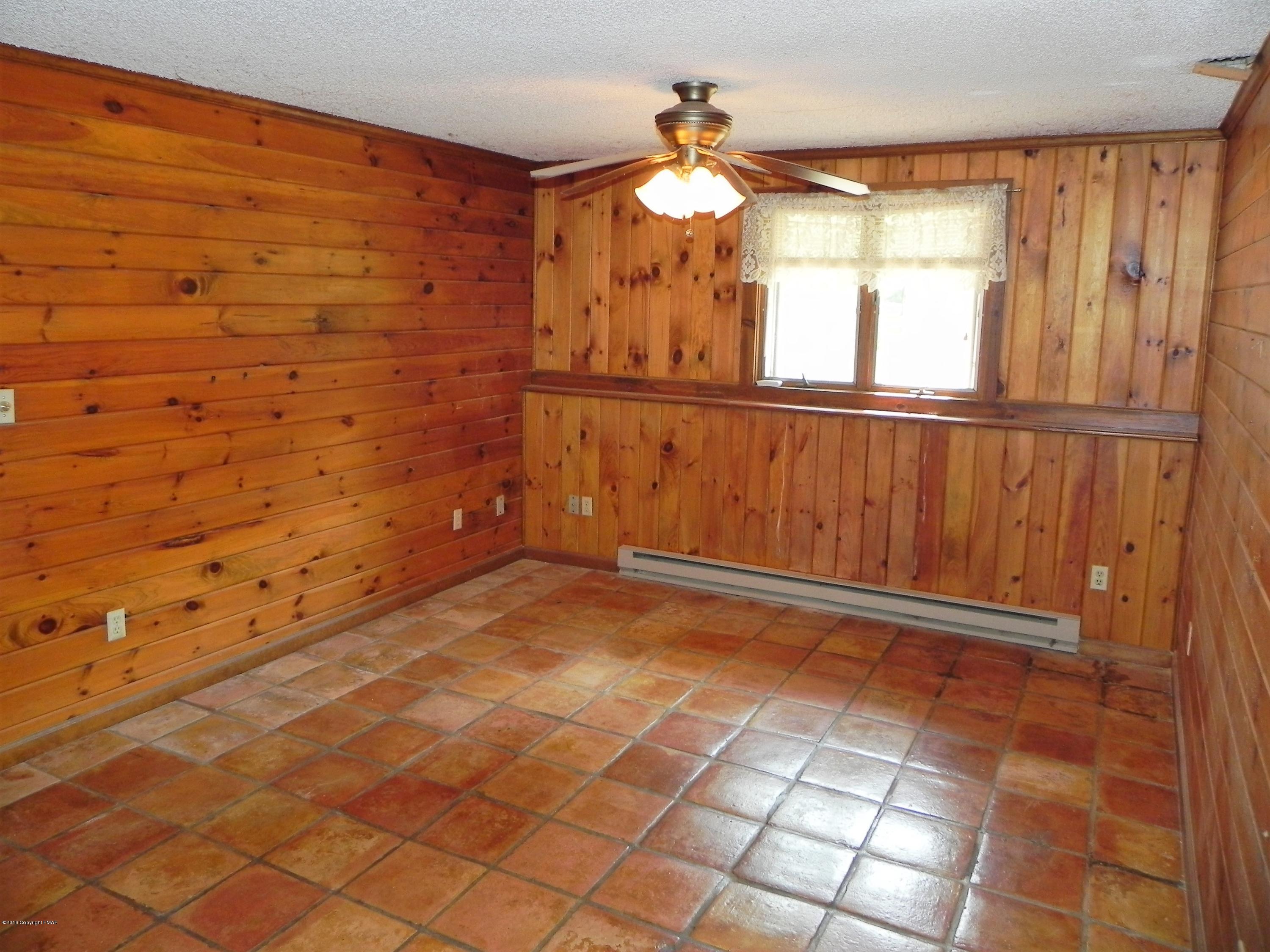 141 Rinker Road Stroudsburg, PA 18360 - Photo 19 of 29 a view of a room with wooden floor and a window