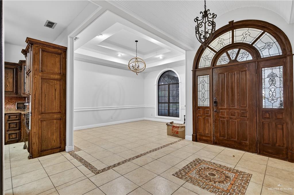 6004 North Cynthia Street McAllen, TX 78504 - Photo 6 of 25 Grand double entry doors with leaded glass sidelights and transom