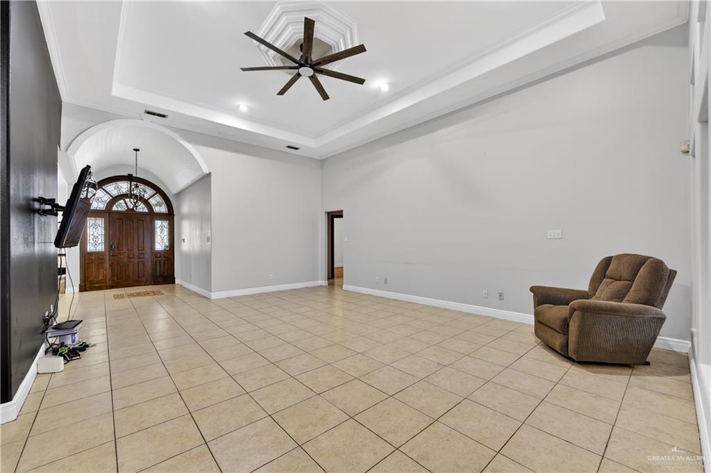 6004 North Cynthia Street McAllen, TX 78504 - Photo 10 of 25 Spacious living area featuring neutral-toned tile flooring throughout