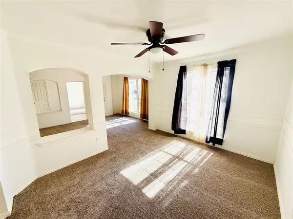 a view of a hallway with front door