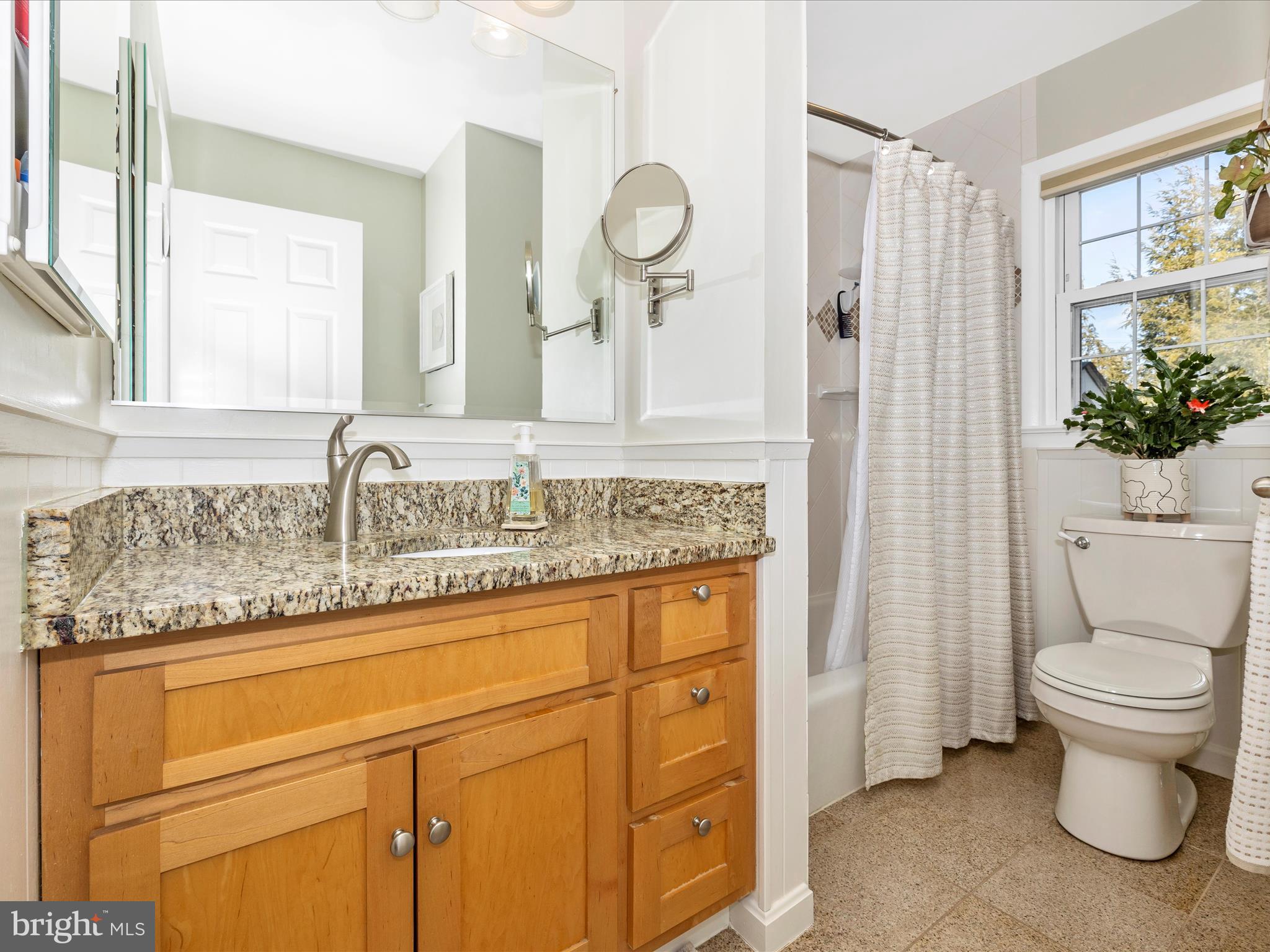 16 Kline Boulevard Frederick, MD 21701 - Photo 11 of 62 a bathroom with a granite countertop sink mirror vanity and toilet